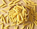 Penne pasta or macaroni in a wooden bowl Royalty Free Stock Photo