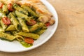 Penne pasta in pesto sauce with grilled chicken Royalty Free Stock Photo