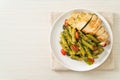 Penne pasta in pesto sauce with grilled chicken Royalty Free Stock Photo