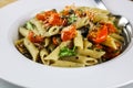 Penne Pasta with Roasted Cherry Tomatoes, Garlic and Capers