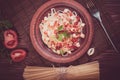 Penne pasta in tomato sauce with chicken, tomatoes decorated with parsley. Royalty Free Stock Photo