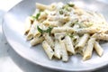 Penne pasta with white sauce and truffle, italian food Royalty Free Stock Photo
