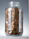 Pennies in jar Royalty Free Stock Photo