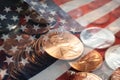 Pennies Stacked Close Up With American Flag silhouette Royalty Free Stock Photo