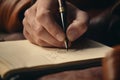 Penning thoughts, Close-up of man\'s hand writing on notebook Royalty Free Stock Photo