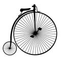 Penny-farthing or high wheel bicycle silhouette isolated on wh