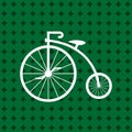 Penny-farthing icon white isolated on green background. antique old bicycle with big wheels. Royalty Free Stock Photo