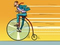 Penny-farthing retro bike, big wheel. Businessman rides forward fast, progress