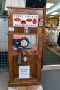 A penny pincher souvenir coin press machine outside of a Yellowstone National Park gift shop