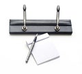 Pens holder and note book on white background