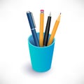 Pens and pencils in blue cup Royalty Free Stock Photo