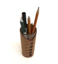 Pens and pencils in pencil holder Royalty Free Stock Photo