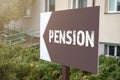 PENSION, Retirement Planning Concept. Pointing arrow sign with text Royalty Free Stock Photo