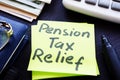 Pension tax relief written on a stick. Royalty Free Stock Photo