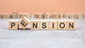 pension word written on wood block. Content text on wooden table for your desing, concept. Royalty Free Stock Photo