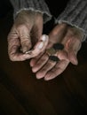 Pensioner counting money into her hands Royalty Free Stock Photo