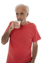Pensioner drinking milk