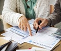 Pensioner filling out a form Royalty Free Stock Photo