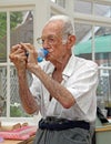 Pensioner on medication pump Royalty Free Stock Photo