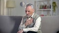 Pensioner suffering chest pain, heart attack, problems with breathing, asthma