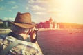 Pensioner tourist in hat capturing Hungarian Parliament building Royalty Free Stock Photo