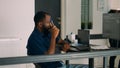 Pensive african american programer working on code development Royalty Free Stock Photo