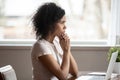 Pensive african American woman look in distance thinking Royalty Free Stock Photo