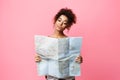 Pensive African Traveler Girl Holding Tourist Map In Studio