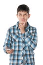 Pensive boy with a cell phone Royalty Free Stock Photo