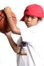 Pensive boy holding a basketball Royalty Free Stock Photo