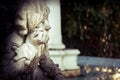 Pensive boy statue in front statue. Royalty Free Stock Photo