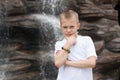 Pensive boy waterfall Royalty Free Stock Photo