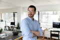 Pensive business man wearing glasses, posing with hands folded Royalty Free Stock Photo