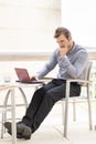 Pensive businessman laptop computer. Royalty Free Stock Photo