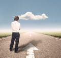 Businessman standing on a road Royalty Free Stock Photo