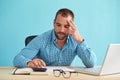 Pensive businessman working in office