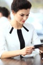 Pensive businesswoman reading an article on tablet computer Royalty Free Stock Photo