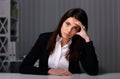 pensive businesswoman sitting at the table Royalty Free Stock Photo
