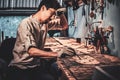 Caftman is restoring ancient broken stained glass