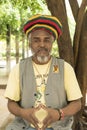 Pensive cuban man with rastafari cap