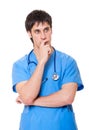 Pensive doctor in blue uniform