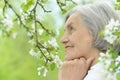 Pensive elderly woman