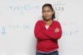 Pensive Girl Against Whiteboard