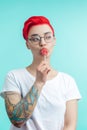 Pensive girl with lollipop on her mouth Royalty Free Stock Photo