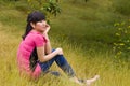 A pensive girl with weeds Royalty Free Stock Photo