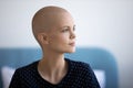 Pensive hairless female dream of happy future after defeating cancer Royalty Free Stock Photo