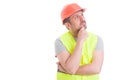 Pensive handsome constructor trying to find a solution Royalty Free Stock Photo