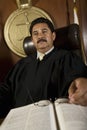 Pensive Judge In Courtroom Royalty Free Stock Photo