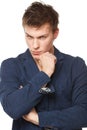 Pensive male standing with folded hands Royalty Free Stock Photo