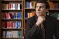 Pensive Man In Shirt And Tie At Library